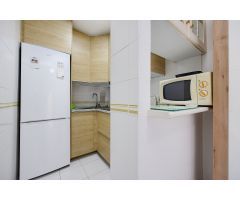 ENCANTADOR ADOSADO EN TORREVIEJA CON 4 DORMITORIOS, TERRAZA PRIVADA Y PISCINA COMUNITARIA