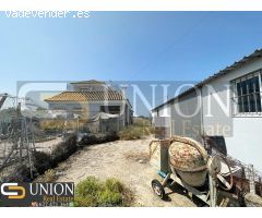 terreno con casa y nave en Montijo