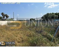 terreno con casa y nave en Montijo