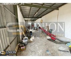 terreno con casa y nave en Montijo