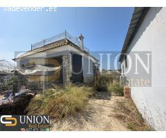terreno con casa y nave en Montijo