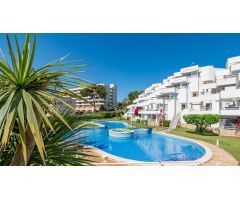 Apartamento reformado con terraza y piscina en Cala Viñes – 2 dormitorios, ideal segunda residencia
