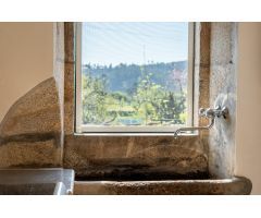 Casa de piedra restaurada en Negreira