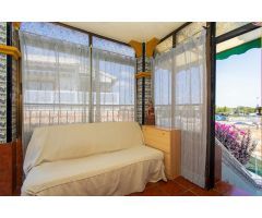 Acogedor  bungalow primera planta en Punta Prima, a Pocos Minutos de la Playa