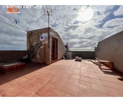 Edificio de dos viviendas + local comercial