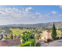 Exclusiva casa adosada con vistas al golf y al mar en Mijas Golf