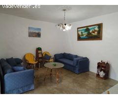 CASA CON ALMACEN, CUEVAS Y TERRENOS.