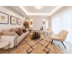 Apartamentos de 2 o 3 dormitorios y villas adosadas con 2 baños que ofrecen jardín o solárium en la