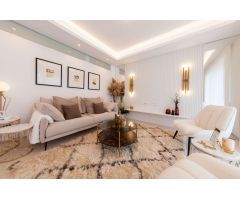 Apartamentos de 2 o 3 dormitorios y villas adosadas con 2 baños que ofrecen jardín o solárium en la