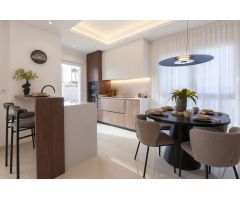 Apartamentos de 2 o 3 dormitorios y villas adosadas con 2 baños que ofrecen jardín o solárium en la