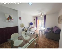 Amplio apartamento amueblado en planta baja con terraza, piscina y parking en Vera Playa