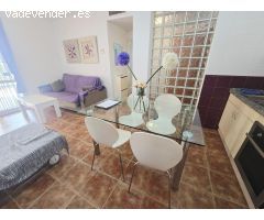 Amplio apartamento amueblado en planta baja con terraza, piscina y parking en Vera Playa
