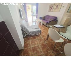 Amplio apartamento amueblado en planta baja con terraza, piscina y parking en Vera Playa