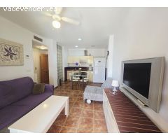 Amplio apartamento amueblado en planta baja con terraza, piscina y parking en Vera Playa