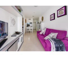 Impecable apartamento de dos dormitorios en edificio Orbiplaya, con piscina comunitaria y garaje inc