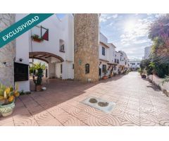 Casa de pescador con amarre