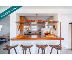 Casa de pescador con amarre