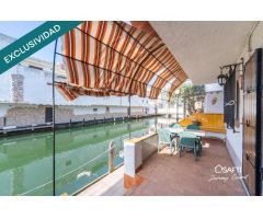 Casa de pescador con amarre