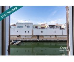 Casa de pescador con amarre