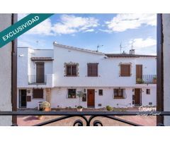 Casa de pescador con amarre