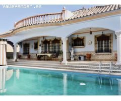 Chalet con Piscina en Sanlucar la Mayor