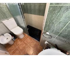 Adosado en urbanización con piscina frente al mar