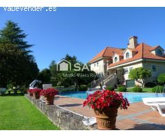 SAFTI vende casa de campo exclusiva de piedra con calidades premium en Teo. Elegancia, espacio y con