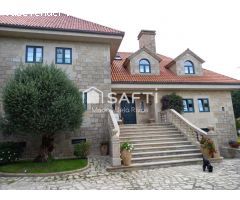 SAFTI vende casa de campo exclusiva de piedra con calidades premium en Teo. Elegancia, espacio y con