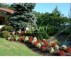 SAFTI vende casa de campo exclusiva de piedra con calidades premium en Teo. Elegancia, espacio y con