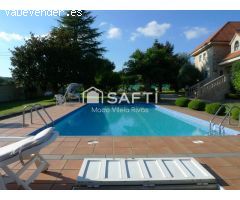 SAFTI vende casa de campo exclusiva de piedra con calidades premium en Teo. Elegancia, espacio y con