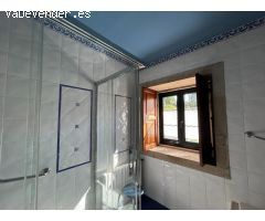 SAFTI vende casa de campo exclusiva de piedra con calidades premium en Teo. Elegancia, espacio y con