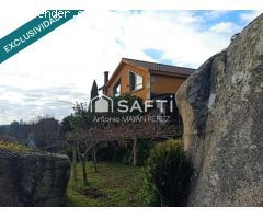 CASA CHALET CON TERRENO EN BRETAL ( RIBEIRA )