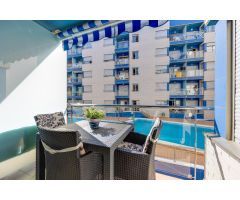 Impecable apartamento de dos dormitorios en edificio Orbiplaya, con piscina comunitaria y garaje inc