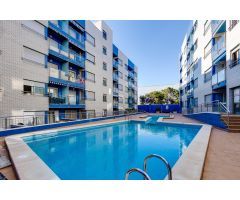 Impecable apartamento de dos dormitorios en edificio Orbiplaya, con piscina comunitaria y garaje inc