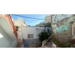 Solar con vivienda para reformar