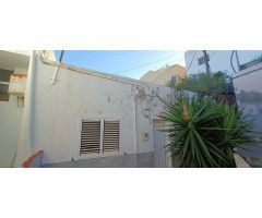 Solar con vivienda para reformar