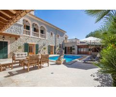 CHALET PIEDRA DE ALTAS CALIDADES EN ES CAPDELLÀ CON PISCINA Y VISTAS A LA MONTAÑA