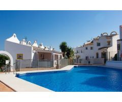 ESPECTACULAR CASA DE DOS DORMITORIOS EN LA RESERVA DE MARBELLA. PISCINA Y JARDINES. SOL TODO EL DIA