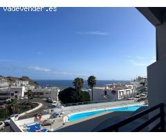 Estudio con vistas al mar, piscina y plaza de aparcamiento