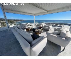 Exclusivo ático dúplex en primera línea de playa.