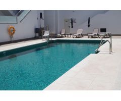 ADOSADO DE DOS DORMITORIOS, DOS BAÑOS Y PISCINA COMUNITARIA
