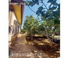 GRAN CHALET SEMIREFORMADO CON DOS VIVIENDAS, GARAJE, TERRAZA Y PARCELA