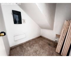Céntrico edificio con local comercial