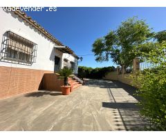 MAGNIFICO CHALET  HIPOTECABLE UBICADA EN LOS ALGARBLES. LA CARLOTA  (CORDOBA)