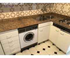 Piso de tres dormitorios, baño, salón, cocina y baño. Interior.