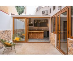 Planta baja reformada de 4 habitaciones y terraza.