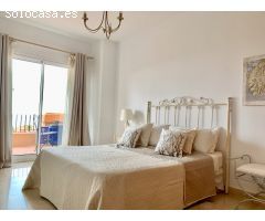 Fabulosa casa pareada  de tres dormitorios con bonitas vistas al mar en Alcaidesa
