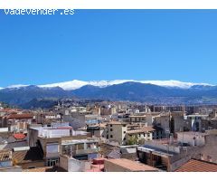 Ático Premium en pleno corazón de Granada. Lujo, comodidad y vistas inigualables.