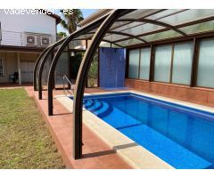 hermosa casa de dos viviendas con piscina climatizada en inmejorable zona Comarruga
