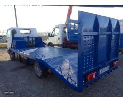 Nissan Cabstar 35.13 GRUA PORTACOCHES. de 2005 con 235.000 Km por 9.800 EUR. en Murcia